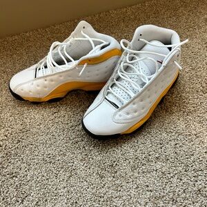 Black and yellow Jordans worn a few times